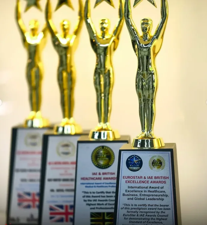 Award plaques and trophies displayed at the clinic