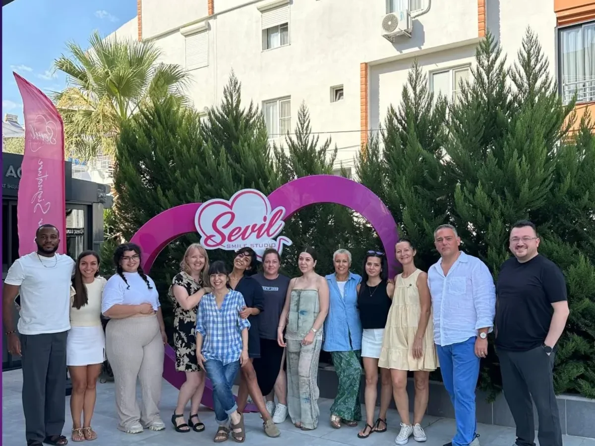 Members of the Sevil Smile team together outside the clinic