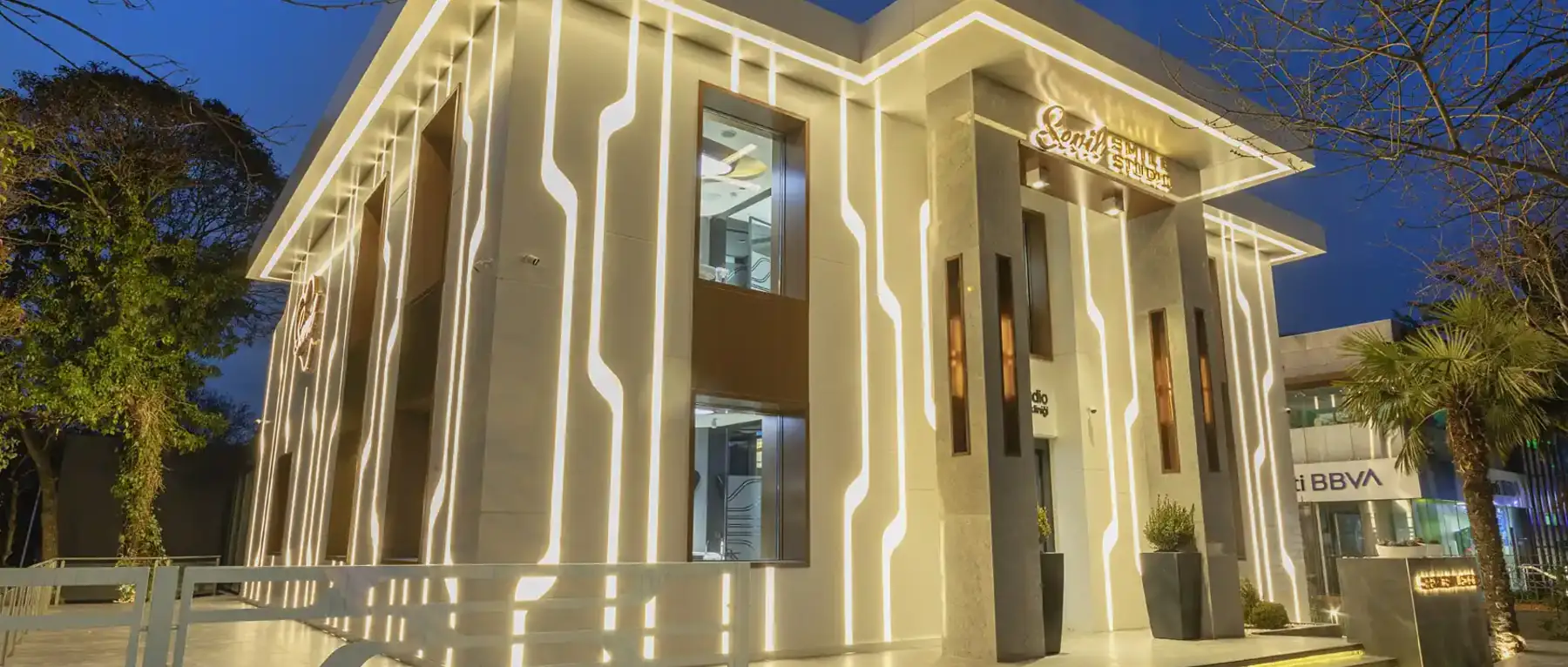 The Sevil Smile clinic building in Etiler, Istanbul, lit at dusk