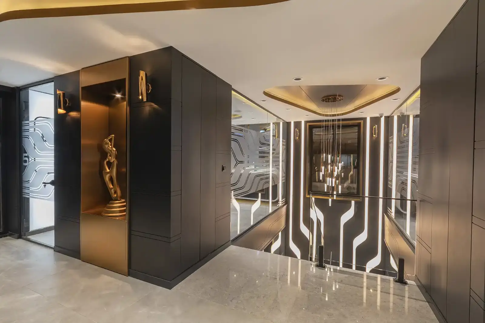 A hallway at our Istanbul clinic, with a sculpture and mirrored panels